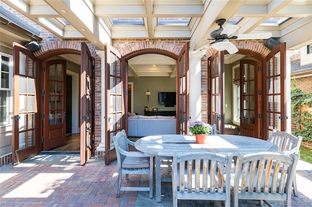 view of patio / terrace with french doors and ceiling fan