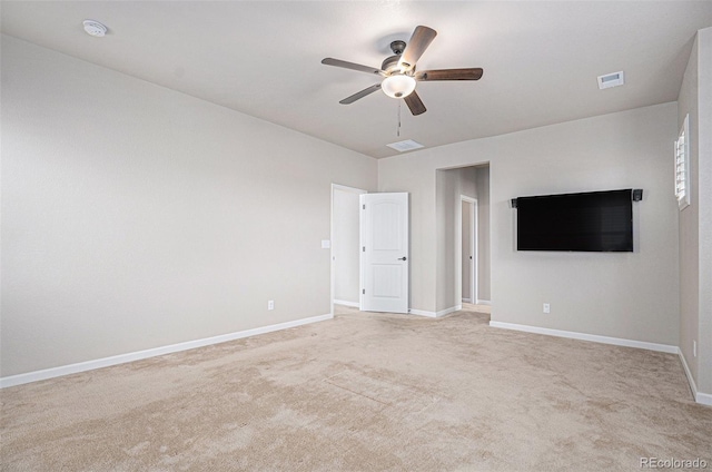 unfurnished bedroom featuring baseboards, ceiling fan, light carpet, and visible vents