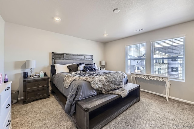 745 N Tempe St, Aurora, CO 80018 - bedroom with baseboards, light carpet, and visible vents
