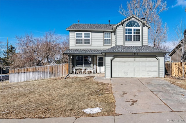 view of front property with a garage, a porch, and a front lawn