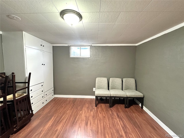 sitting room featuring wood finished floors and baseboards