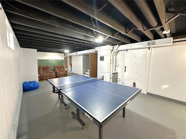 playroom featuring visible vents and finished concrete flooring