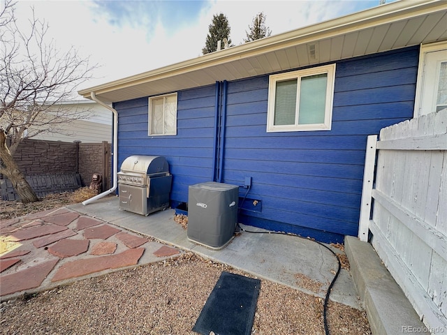 exterior space with a patio area and fence