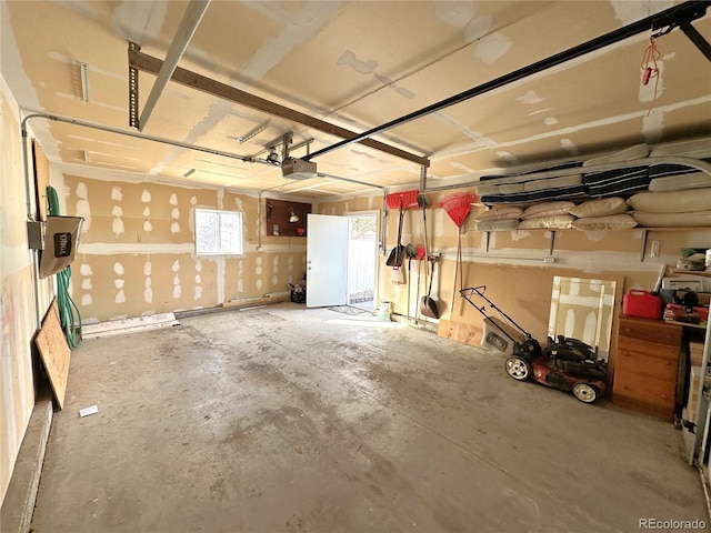 garage featuring a garage door opener