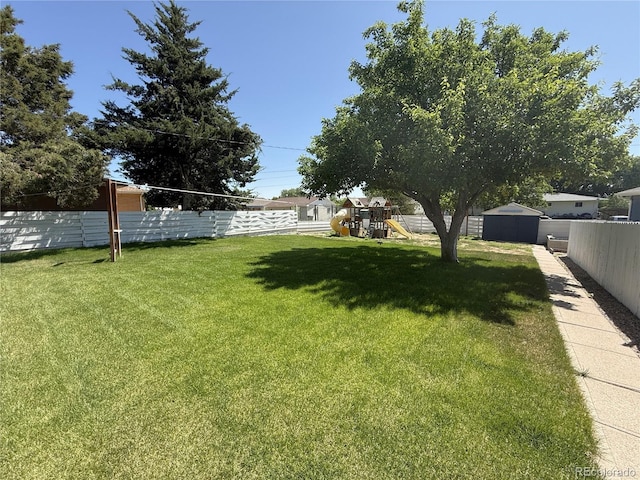 556 M Ave, Limon, CO 80828 - fenced backyard with a playground and a storage shed