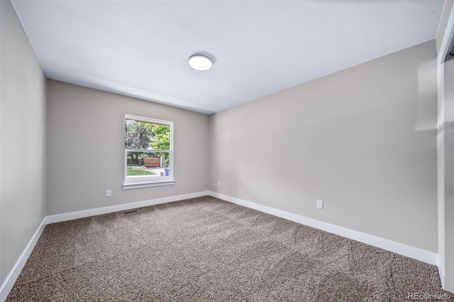 4064 S Olathe Ct, Aurora, CO 80013 - carpeted empty room with baseboards