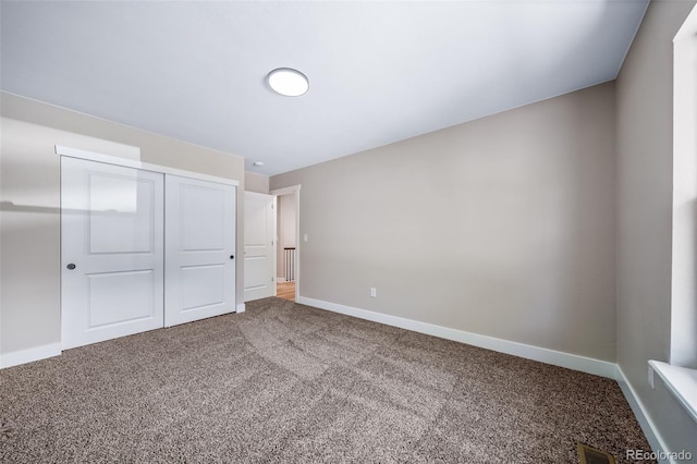 4064 S Olathe Ct, Aurora, CO 80013 - unfurnished bedroom featuring carpet flooring and a closet