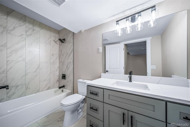 4064 S Olathe Ct, Aurora, CO 80013 - bathroom with vanity, marble look tile flooring, and bathtub / shower combination
