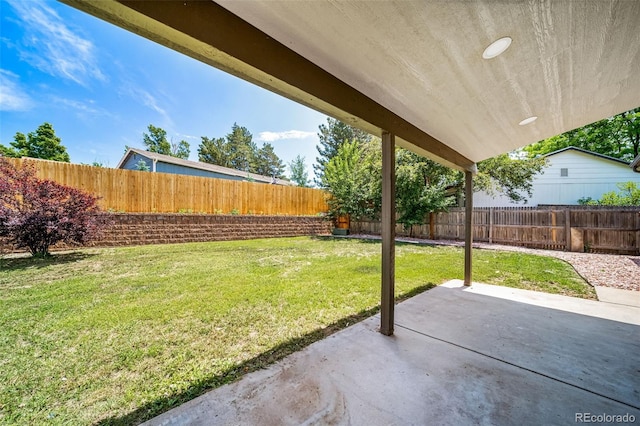 4064 S Olathe Ct, Aurora, CO 80013 - fenced backyard with a patio