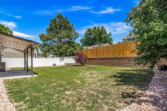 4064 S Olathe Ct, Aurora, CO 80013 - fenced backyard with a patio area