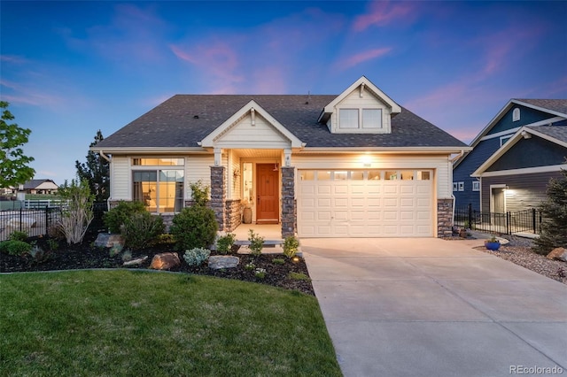 19688 E 52nd Ave, Denver, CO 80249 - craftsman-style home featuring stone siding, concrete driveway, an attached garage, and a shingled roof
