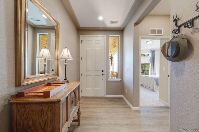 19688 E 52nd Ave, Denver, CO 80249 - foyer entrance featuring light wood-style floors, baseboards, and recessed lighting
