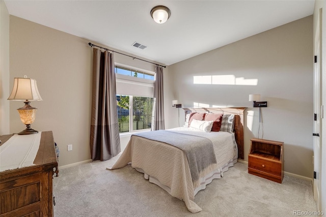 19688 E 52nd Ave, Denver, CO 80249 - bedroom with lofted ceiling, light colored carpet, and baseboards