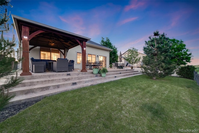 19688 E 52nd Ave, Denver, CO 80249 - rear view of house featuring a patio, a gazebo, an outdoor living space, a ceiling fan, and outdoor dining space