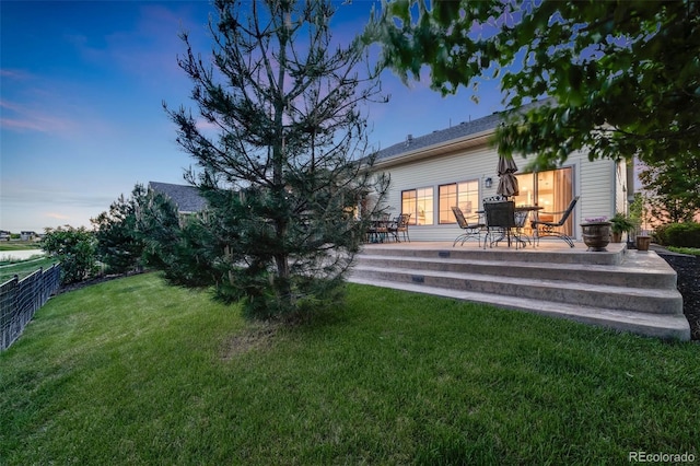 19688 E 52nd Ave, Denver, CO 80249 - rear view of property with a wooden deck and outdoor dining area