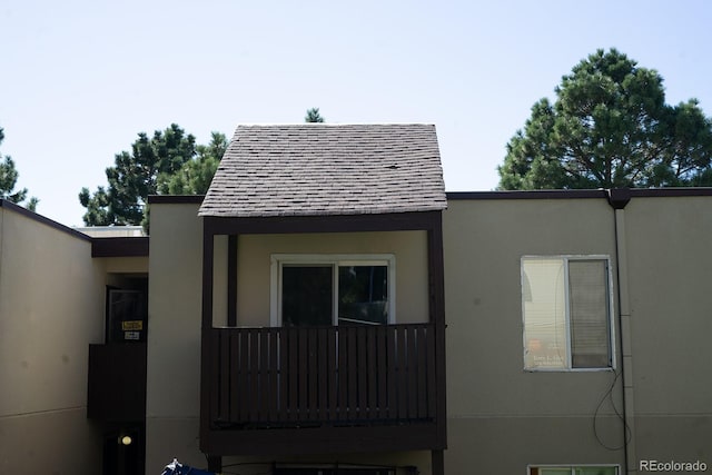 view of property exterior with a balcony