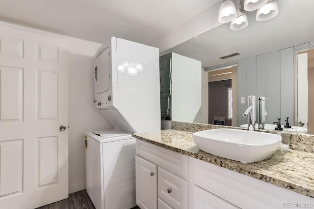 bathroom featuring vanity and hardwood / wood-style floors