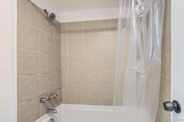 bathroom featuring shower / bathtub combination with curtain