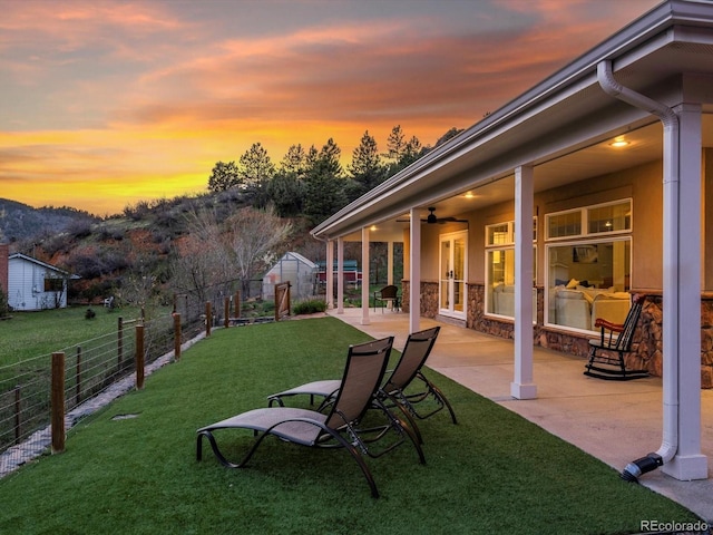 2571 SW Grapevine Rd, Idledale, CO 80453 - view of yard with a patio and ceiling fan