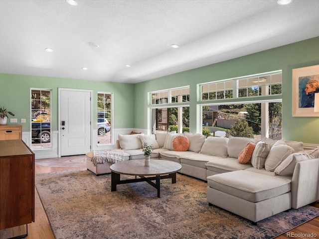 2571 SW Grapevine Rd, Idledale, CO 80453 - living room with recessed lighting, wood finished floors, and wainscoting