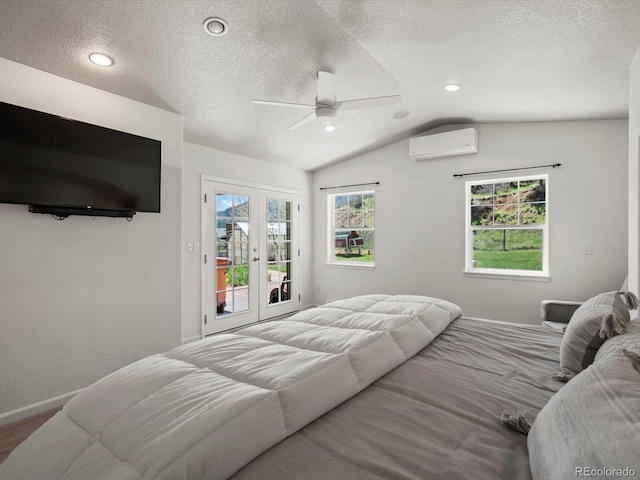 2571 SW Grapevine Rd, Idledale, CO 80453 - bedroom with a wall unit AC, access to outside, a textured ceiling, vaulted ceiling, and baseboards