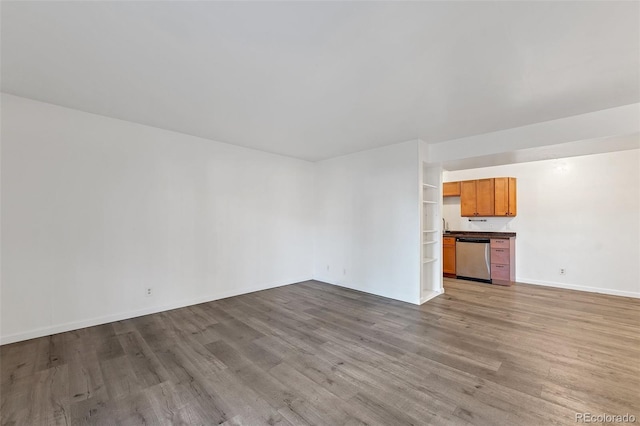 unfurnished living room featuring light wood-type flooring