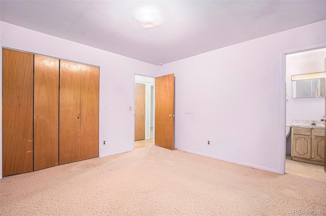 9590 Lowell Blvd, Westminster, CO 80031 - unfurnished bedroom featuring carpet, a closet, and ensuite bath