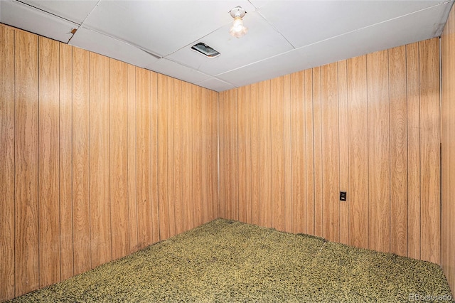 9590 Lowell Blvd, Westminster, CO 80031 - spare room with carpet flooring and wood walls