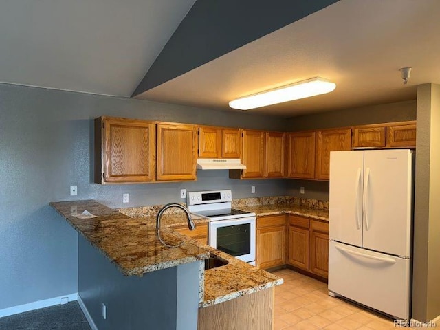 12304 W Cross Dr Unit 304, Littleton, CO 80127 - kitchen featuring white appliances, under cabinet range hood, light stone counters, a peninsula, and brown cabinetry