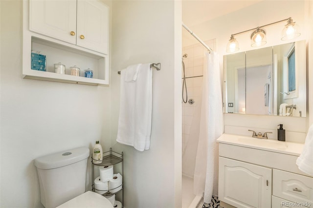 full bath featuring curtained shower, vanity, and toilet