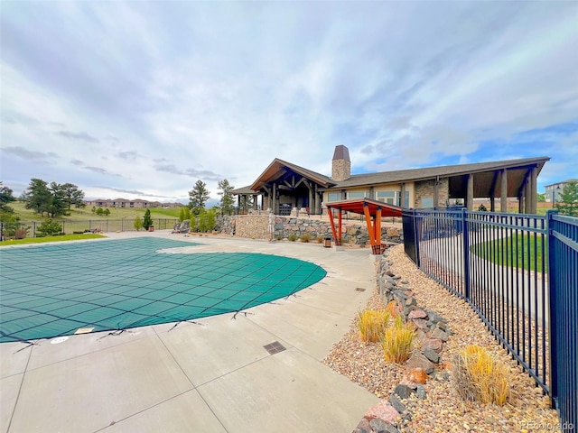 24943 E Phillips Pl, Aurora, CO 80016 - view of swimming pool with a patio, a fenced in pool, and fence