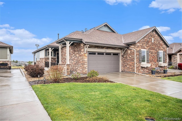 24943 E Phillips Pl, Aurora, CO 80016 - view of front facade featuring driveway, a shingled roof, a front lawn, an attached garage, and brick siding