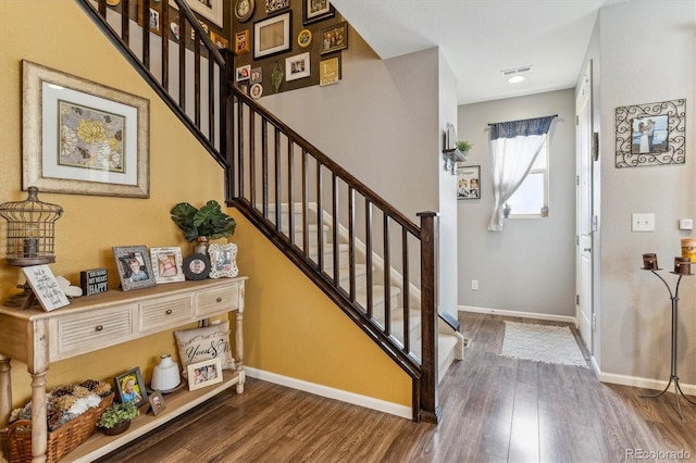 foyer featuring dark hardwood / wood-style floors