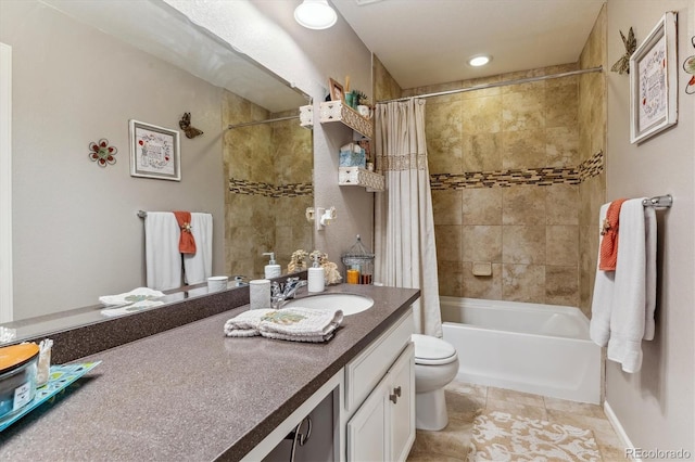 full bathroom featuring tile patterned flooring, vanity, toilet, and shower / tub combo