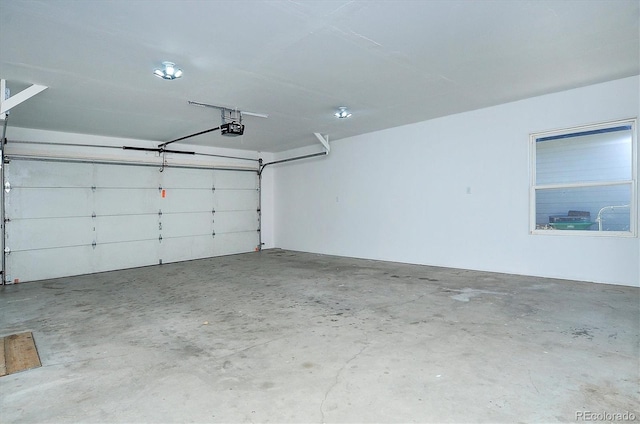 164 Robert Dr, Buena Vista, CO 81211 - garage featuring a garage door opener