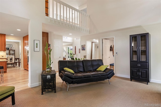 16268 E Belleview Dr, Centennial, CO 80015 - living area with light carpet and a towering ceiling