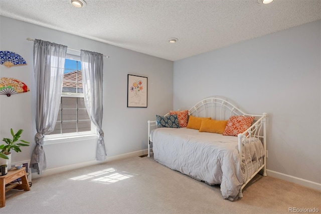 16268 E Belleview Dr, Centennial, CO 80015 - bedroom featuring carpet floors, a textured ceiling, and recessed lighting