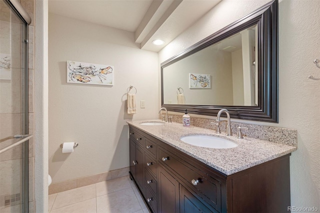 16268 E Belleview Dr, Centennial, CO 80015 - full bathroom featuring double vanity, tile patterned floors, and a tile shower