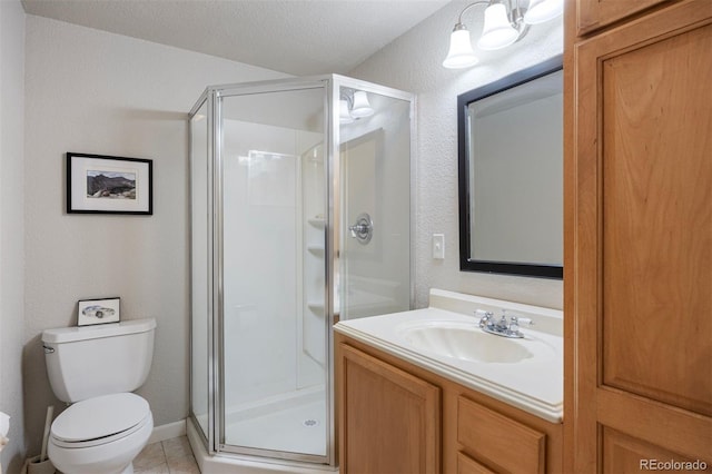 16268 E Belleview Dr, Centennial, CO 80015 - full bathroom with a shower stall, vanity, tile patterned floors, and a textured wall