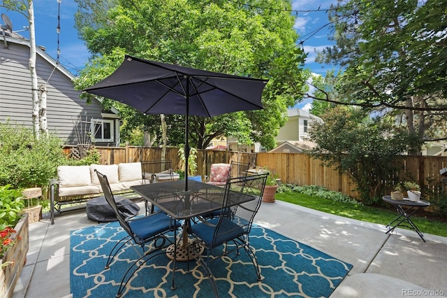 16268 E Belleview Dr, Centennial, CO 80015 - fenced backyard with outdoor dining space, a patio, and an outdoor hangout area