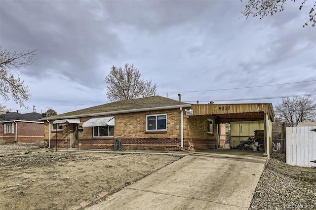 view of front of house with a carport