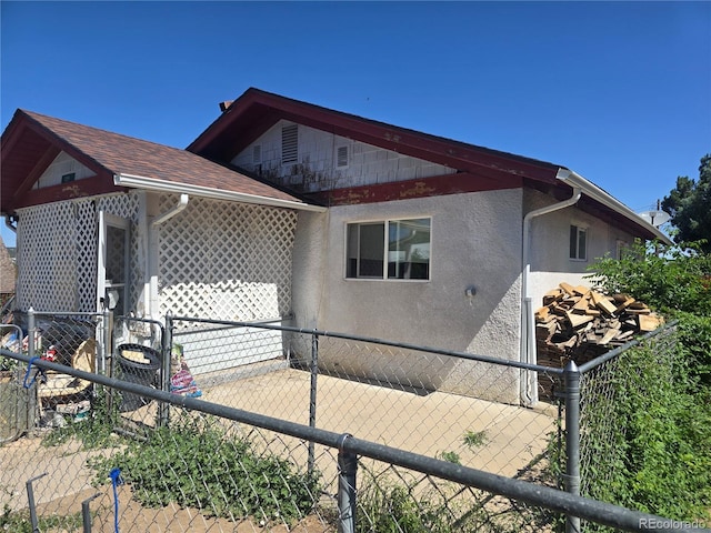 1215 E 7th St, Trinidad, CO 81082 - view of side of property with stucco siding