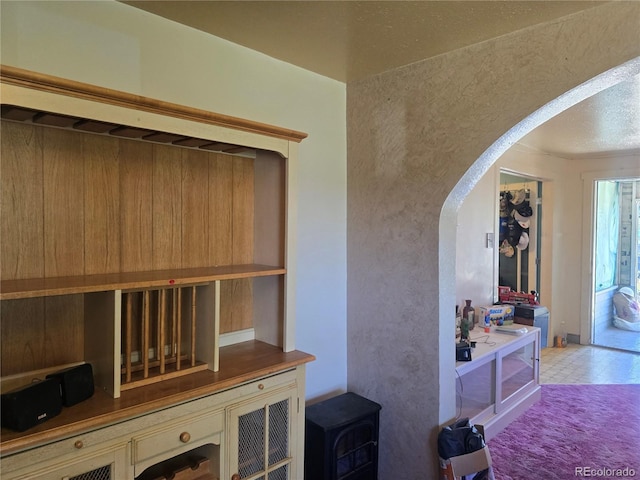 1215 E 7th St, Trinidad, CO 81082 - interior space featuring arched walkways and tile patterned floors