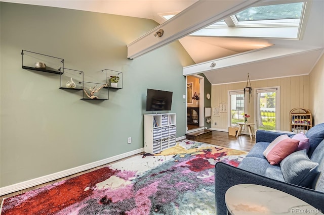 2684 S Adams St, Denver, CO 80210 - living room with a skylight, lofted ceiling, and wood finished floors