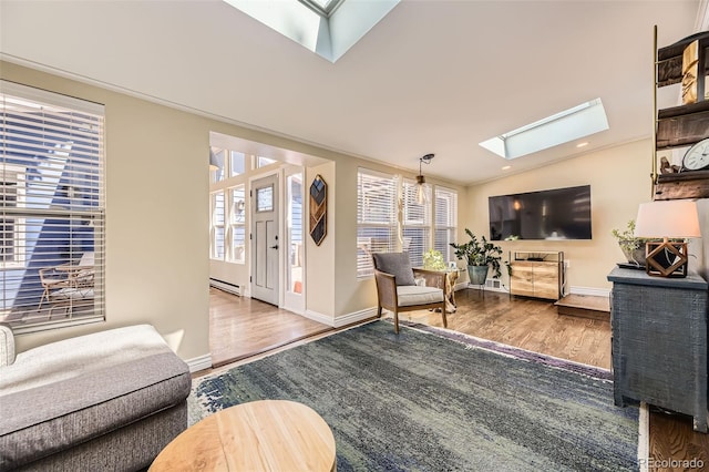 2684 S Adams St, Denver, CO 80210 - living area with a skylight, wood finished floors, baseboards, and recessed lighting