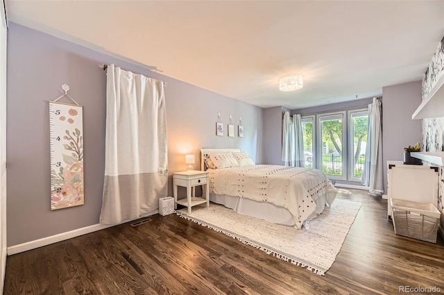 2684 S Adams St, Denver, CO 80210 - bedroom featuring wood finished floors and baseboards