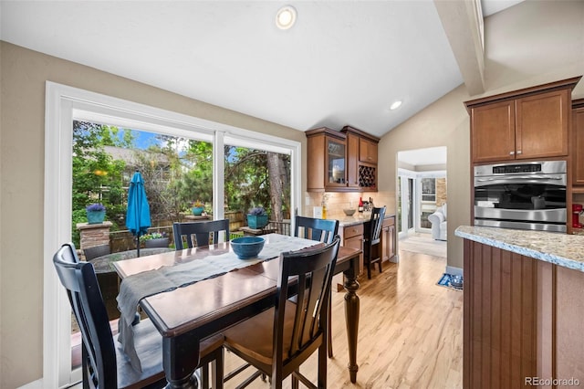 7717 S Grape Ct, Centennial, CO 80122 - dining area with light wood finished floors and recessed lighting
