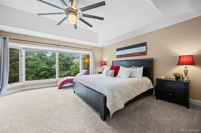 7717 S Grape Ct, Centennial, CO 80122 - carpeted bedroom with a ceiling fan and a tray ceiling
