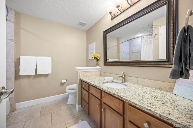 7717 S Grape Ct, Centennial, CO 80122 - bathroom featuring vanity, toilet, baseboards, a shower with curtain, and a textured ceiling