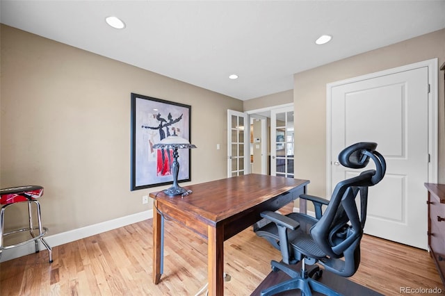 7717 S Grape Ct, Centennial, CO 80122 - office area featuring french doors, baseboards, light wood finished floors, and recessed lighting